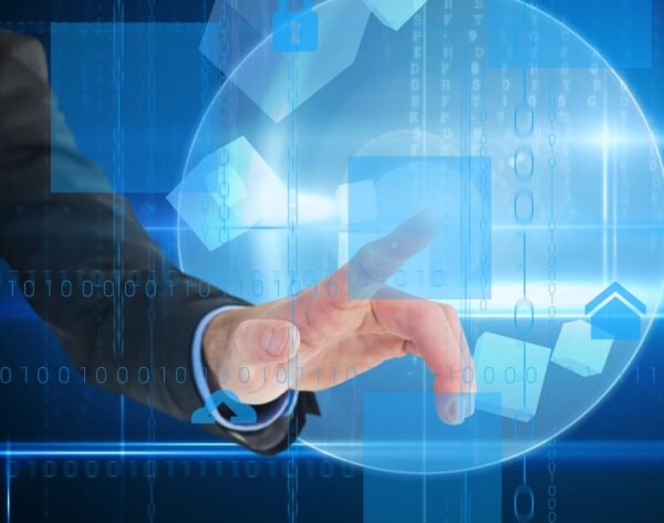 composite of hand pointing at graphics with blue background